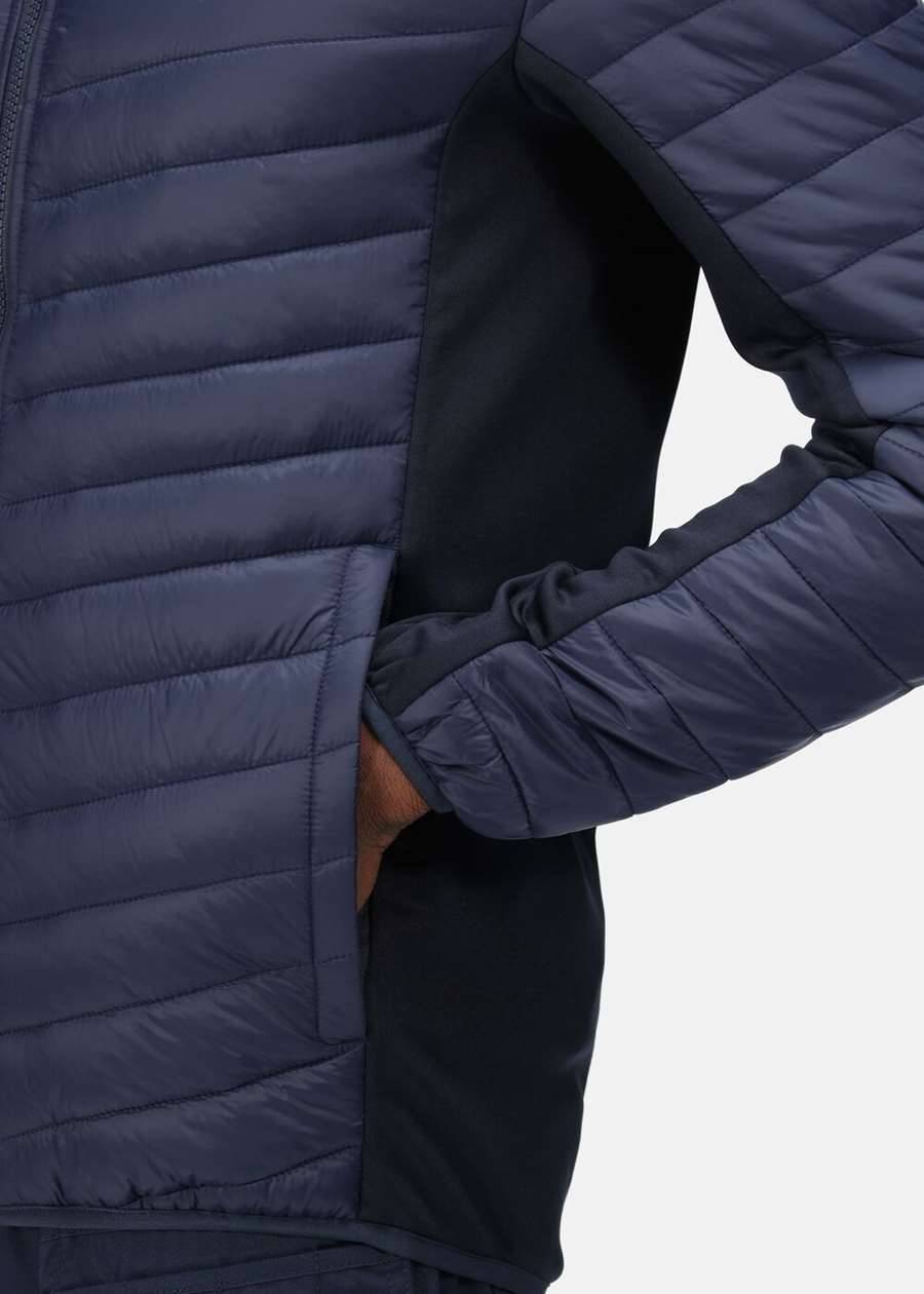 Kurtka puchowa Regatta pikowana z bocznymi panelami w technologii softshell